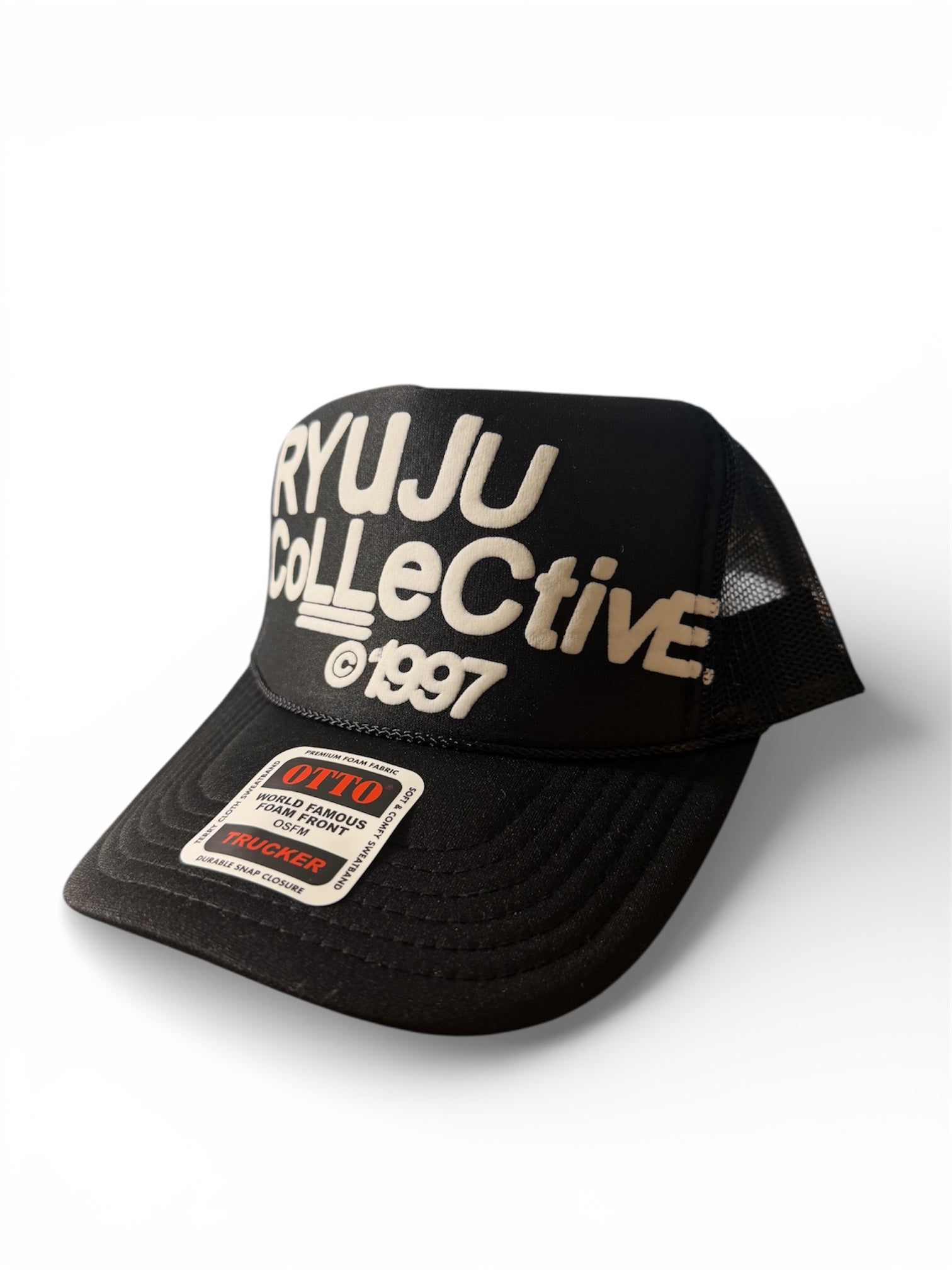 RYUJU COLLECTIVE STAPLE TRUCKER HAT